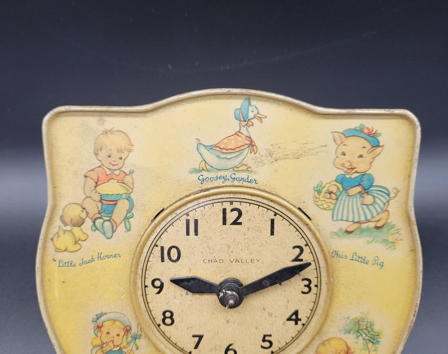 Vintage 1950s child's nursery rhyme clock by Chad Valley