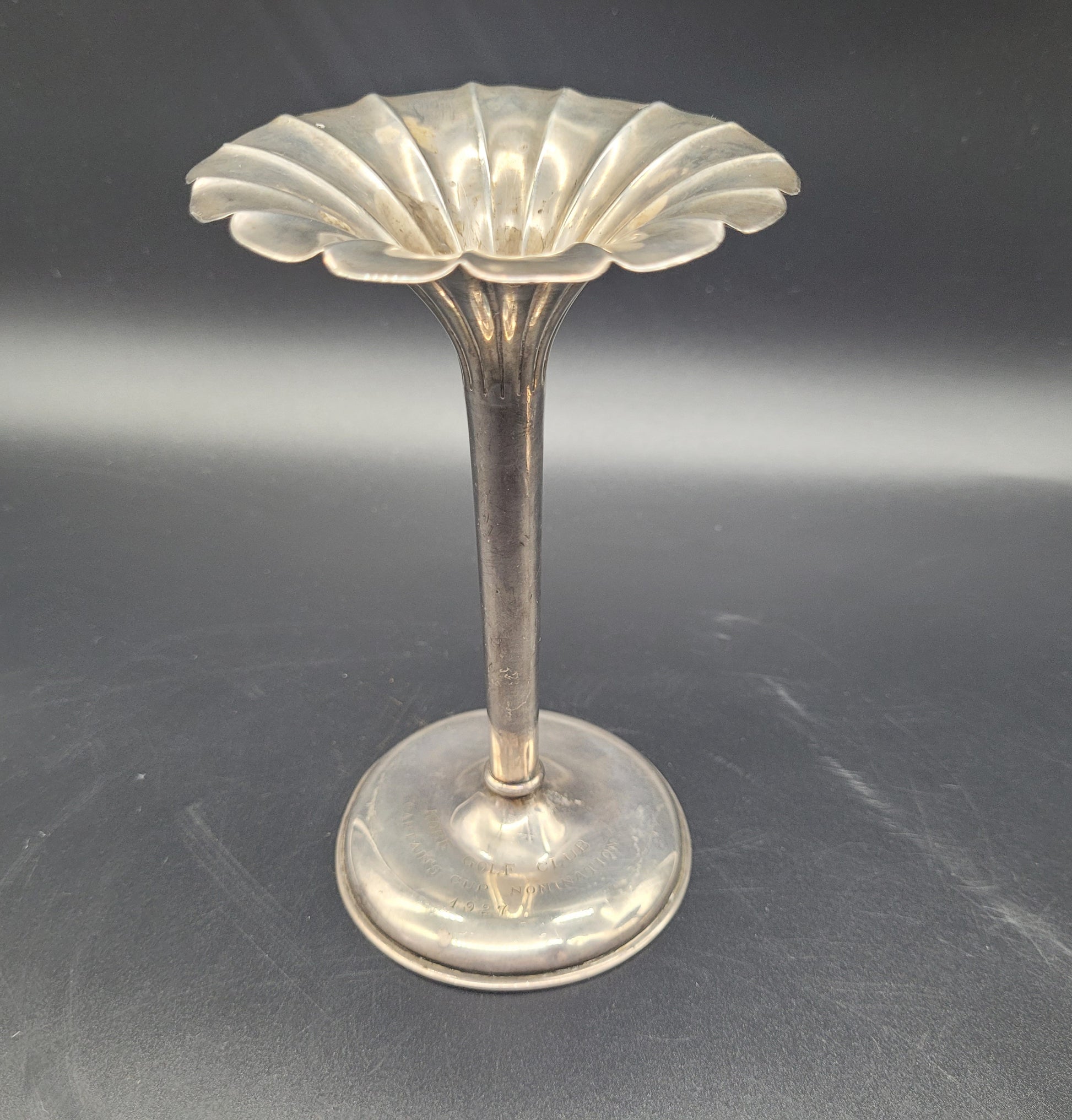 ANTIQUE SILVER USA A very nice pair of sterling silver tulip posy vases, each set with fanned rims and graduated bases. With an inscription relating to a golfing competition.