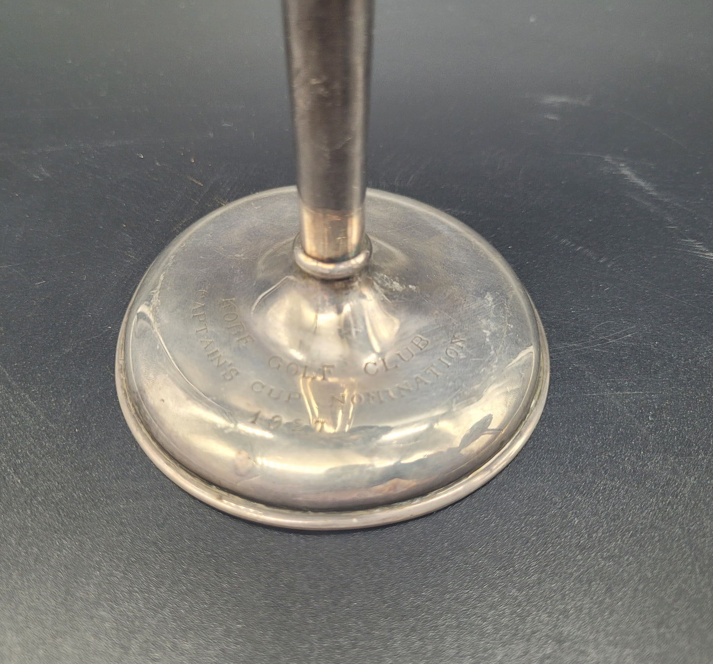 BUY ANTIQUES ONLINE A very nice pair of sterling silver tulip posy vases, each set with fanned rims and graduated bases. With an inscription relating to a golfing competition.