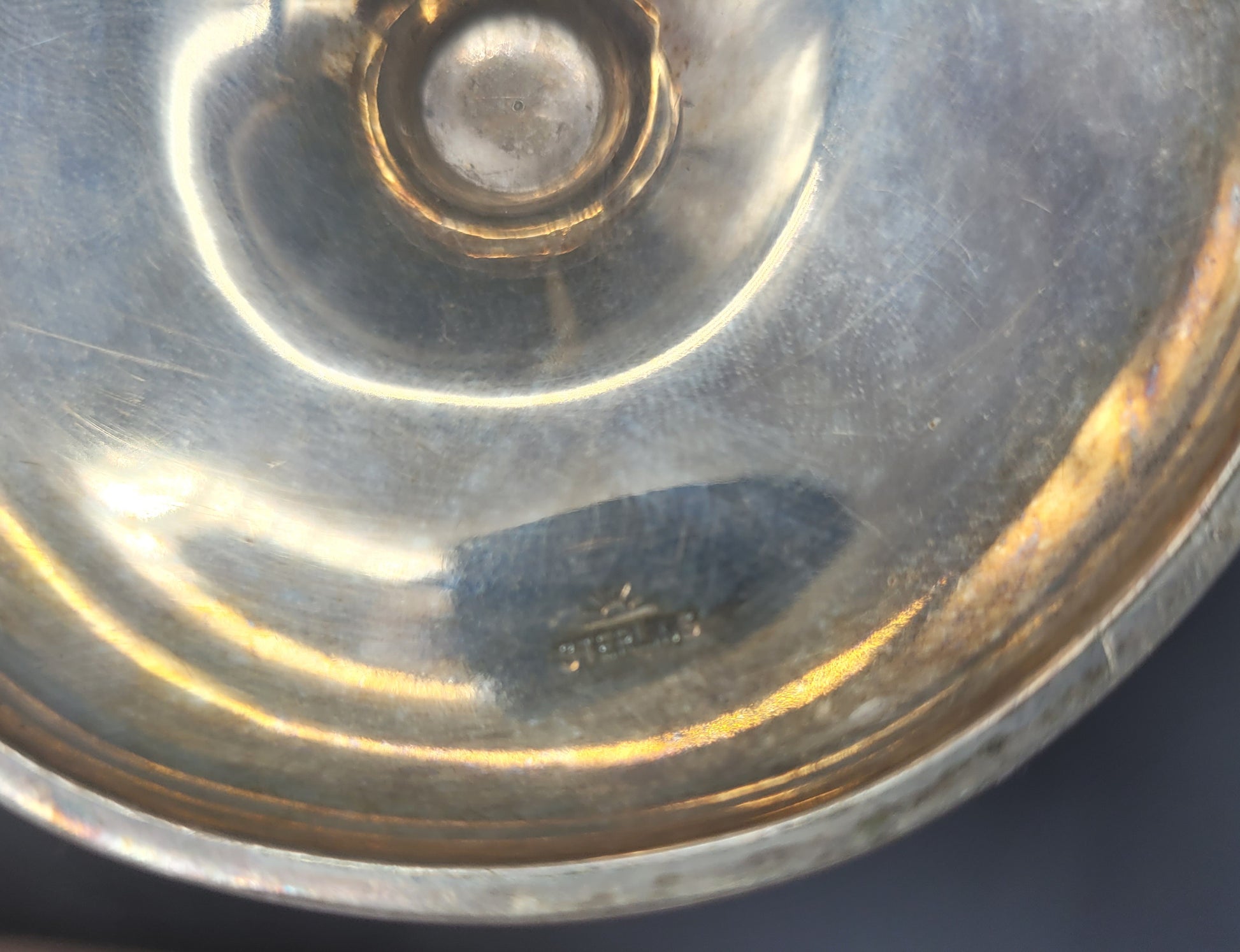 KB ANTIQUES & JEWELLERY A very nice pair of sterling silver tulip posy vases, each set with fanned rims and graduated bases. With an inscription relating to a golfing competition.