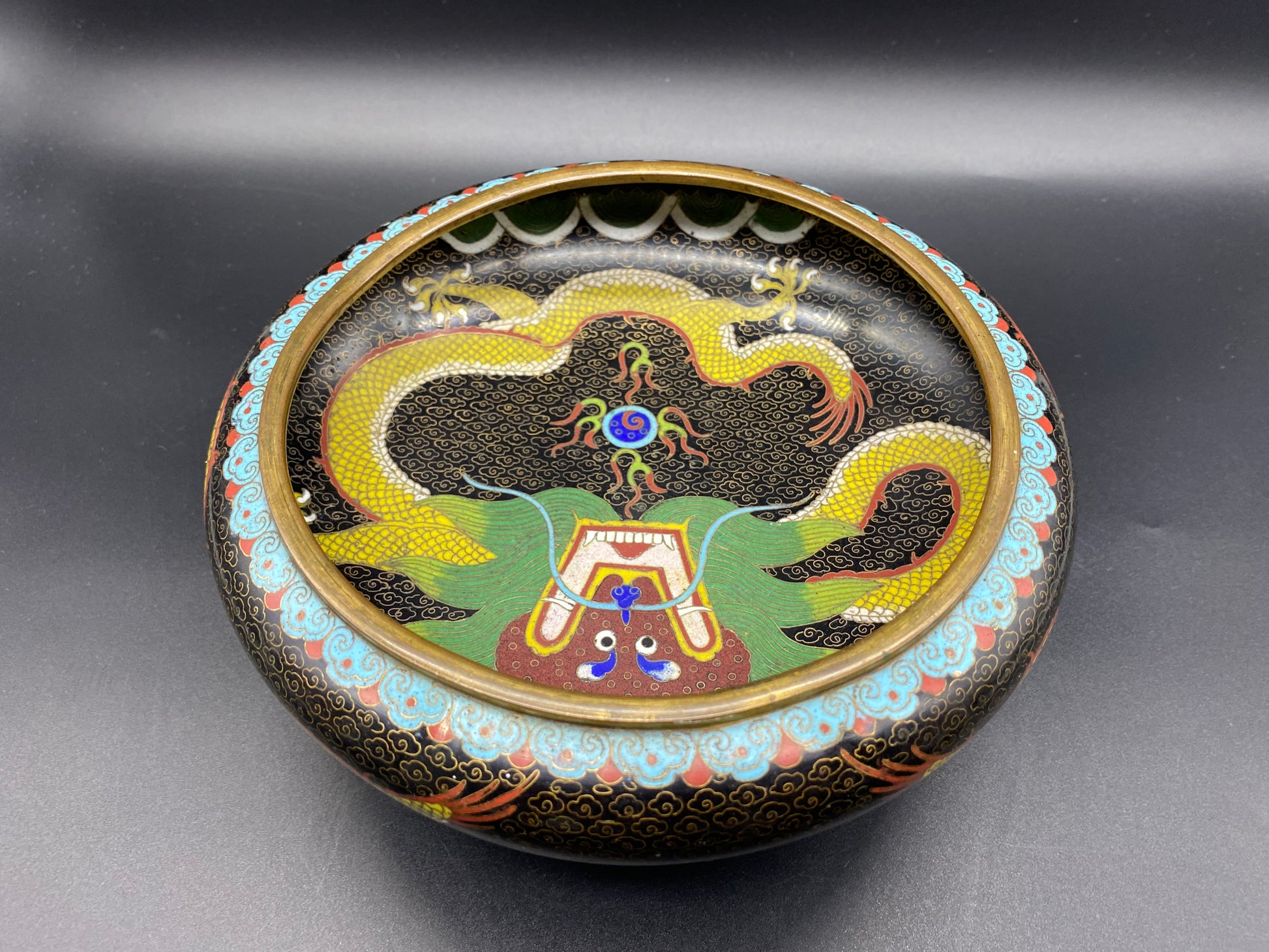 Uniform shape. Properly made Cloisonne beads should not have any pits or high spots. Each section should be completely filled with enamel.