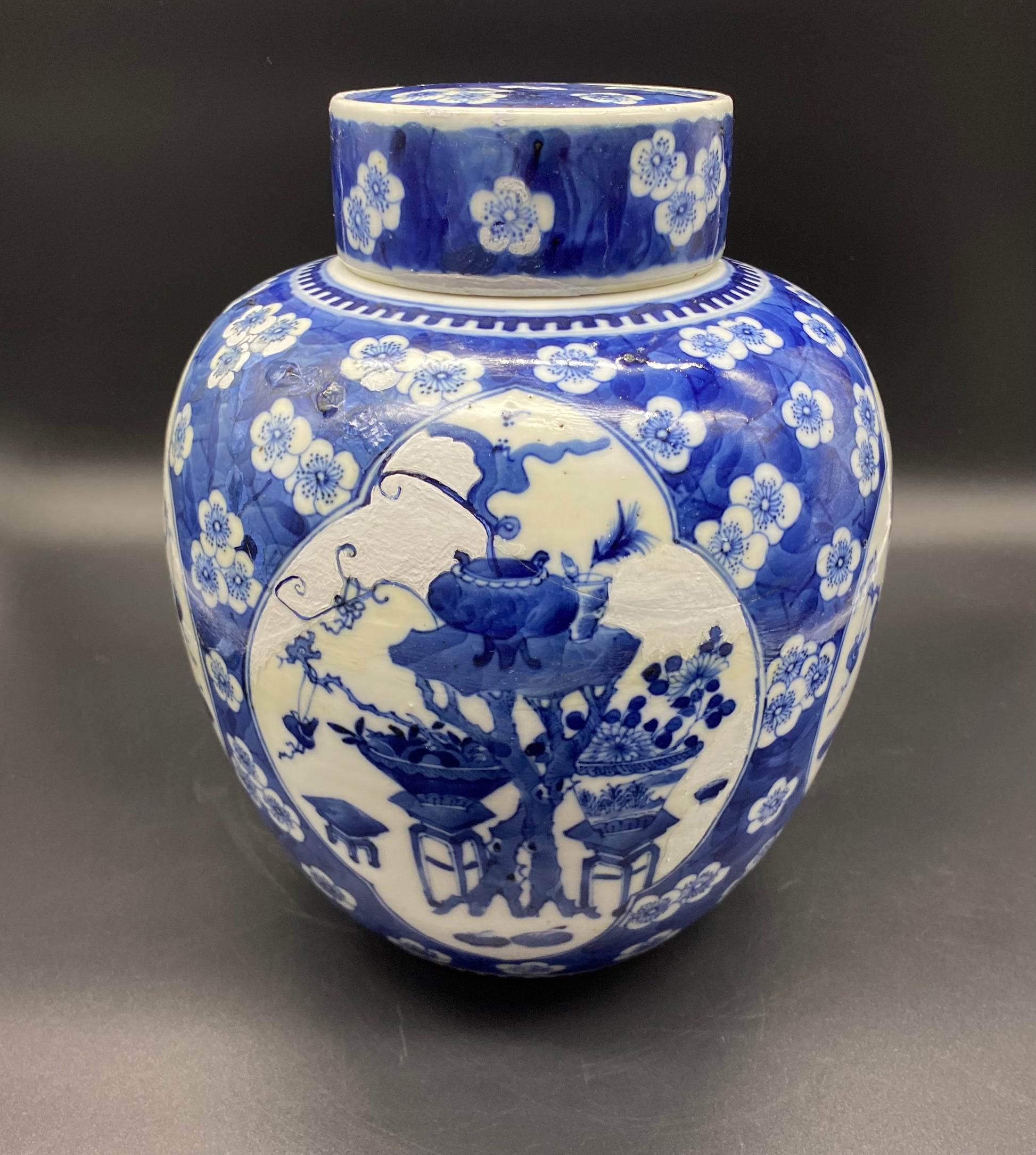 The beautiful blue color and prunus decoration make it a valuable addition to any collection.