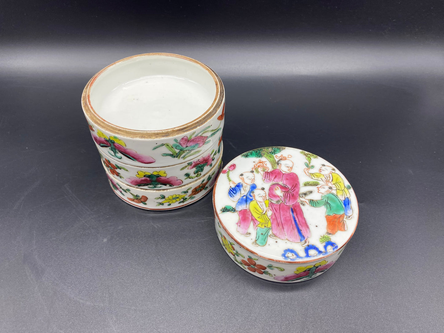 A Four Tier Chinese Porcelain Stacking Box Decorated with Famille Rose Colours 