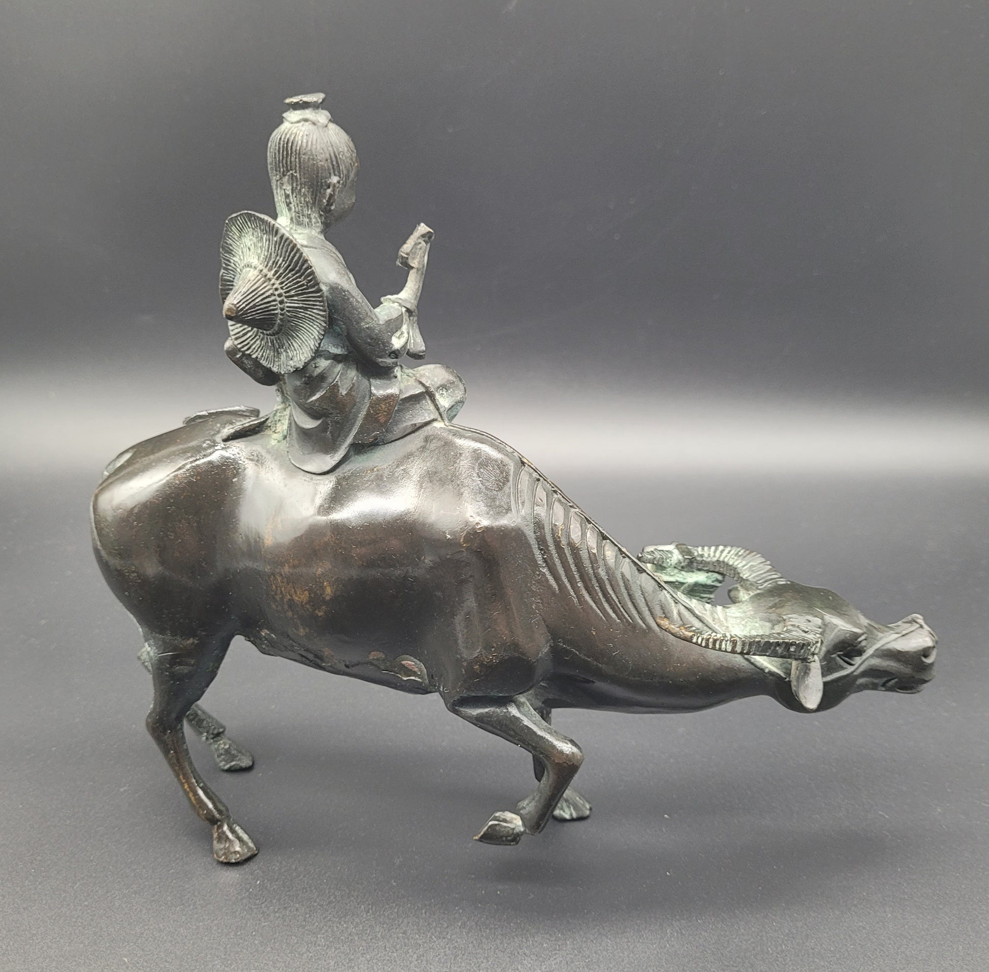 Qing Chinese Bronze of Lohan Seated On An Ox  