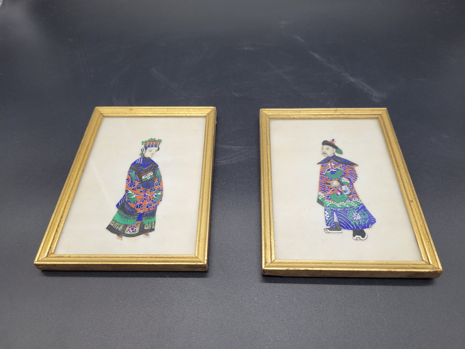 Two very well painted and nicely framed paintings on Pith / Rice Paper of a man and women in Traditional Chinese dress.