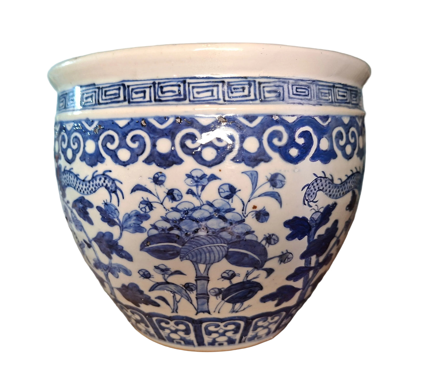 An antique Chinese blue and white fish bowl with dragon and flower decoration in underglaze blue