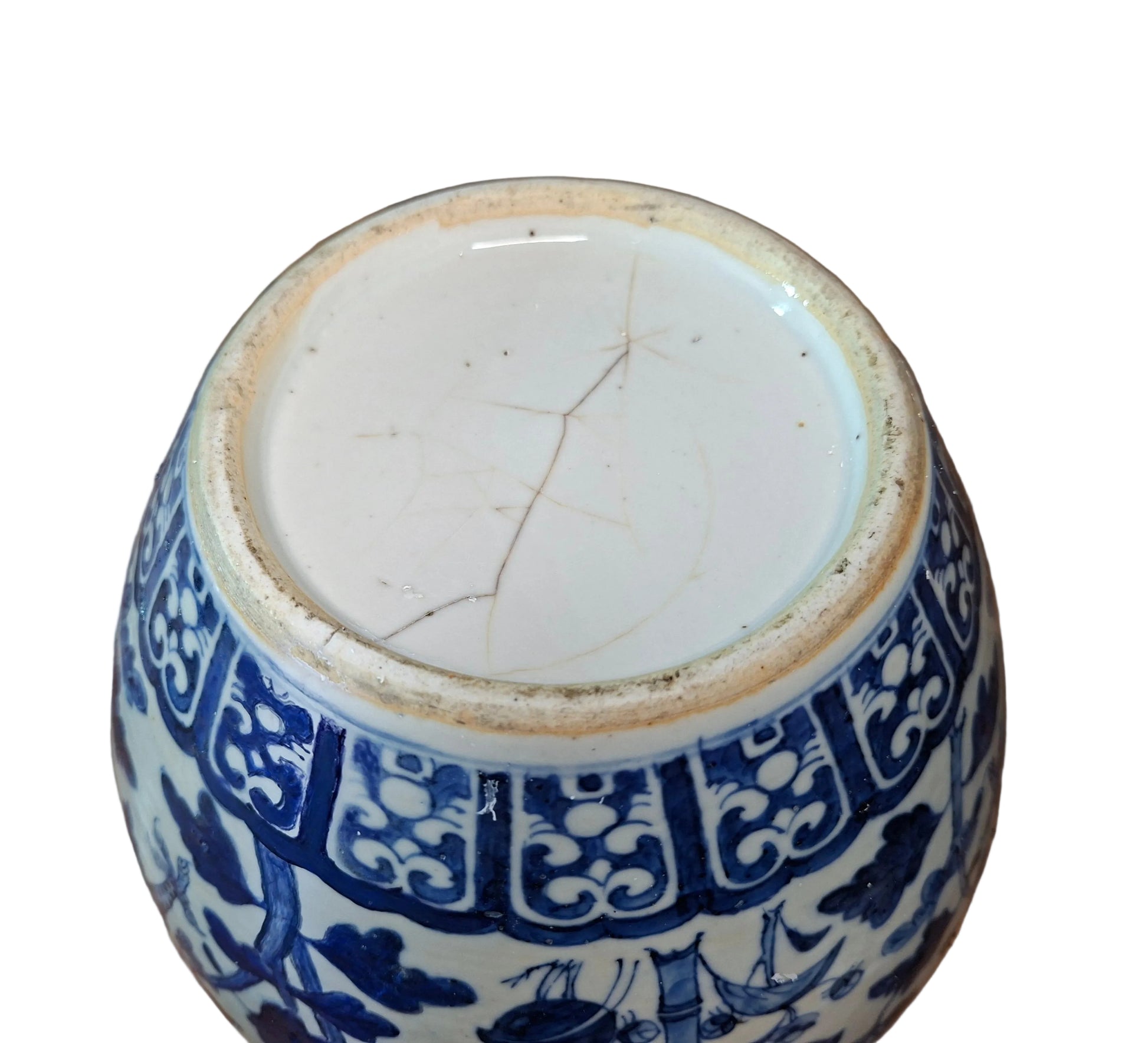 The bottom of a late 18th or early 19th century Chinese blue and white fish bowl with dragon and flower decoration