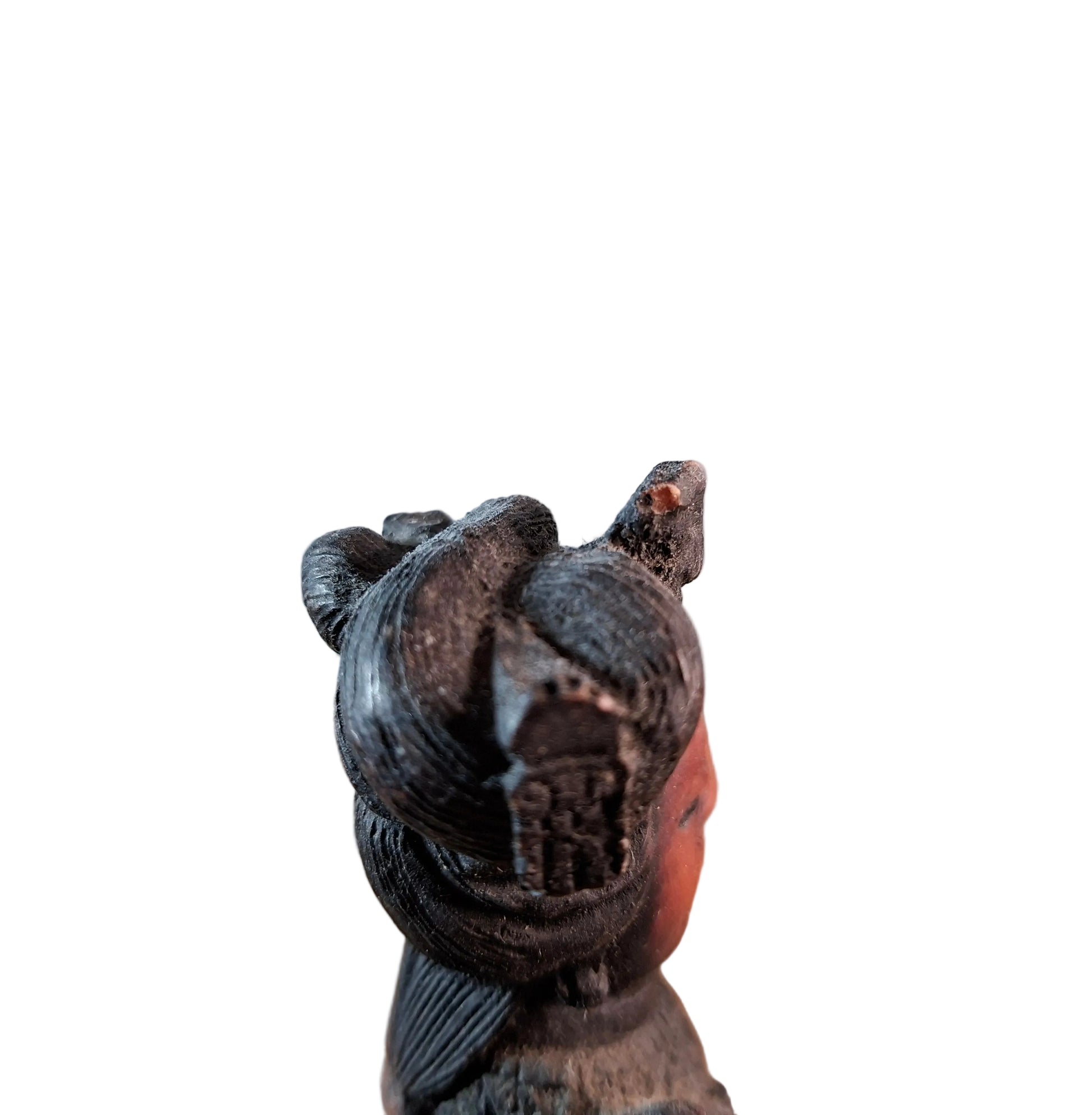 Top view of a Antique Carved Resin Asian Figure-Statue