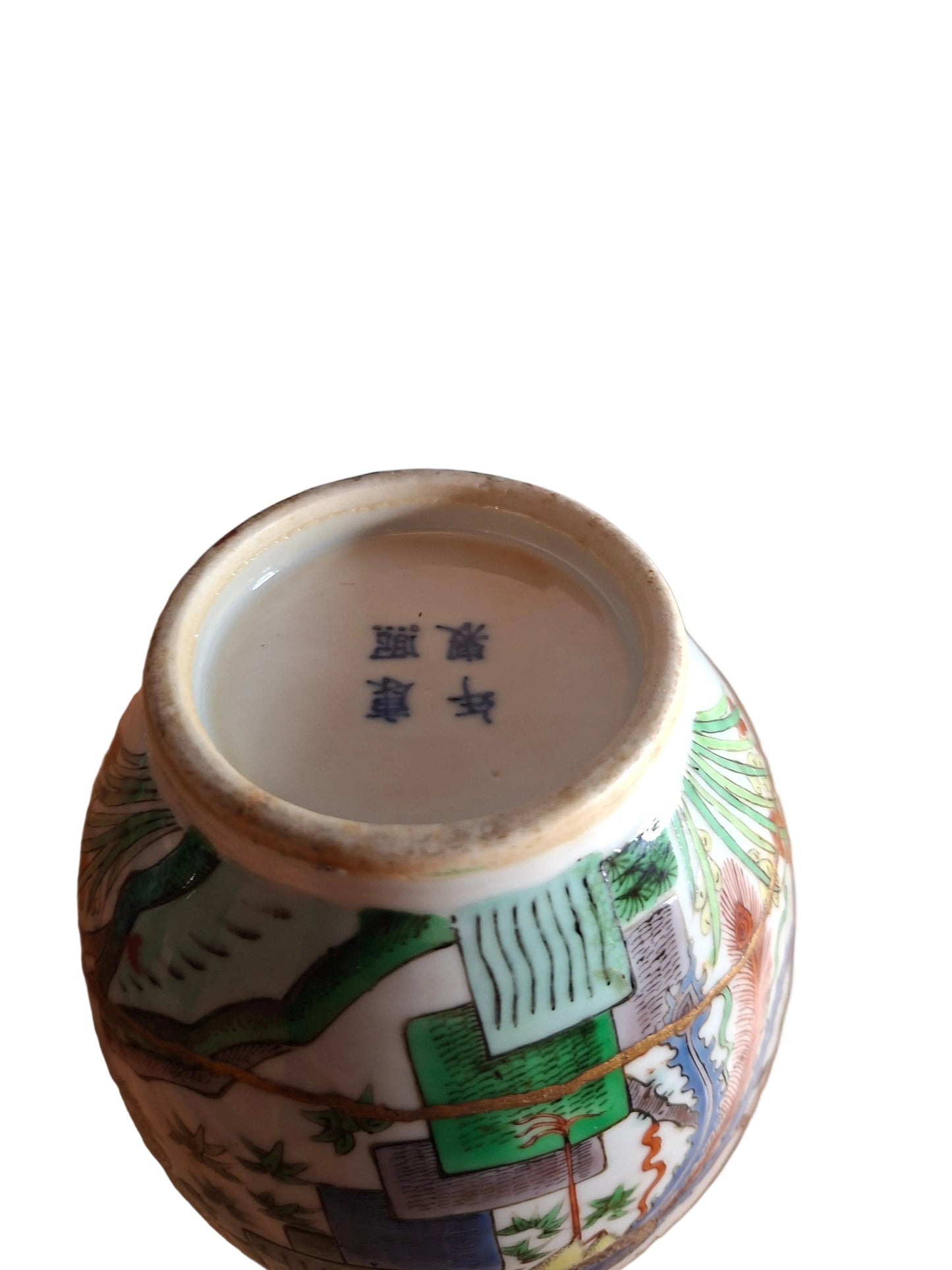 Bottom of an Antique Chinese Porcelain Vase decorated with birds in the famille vert colours