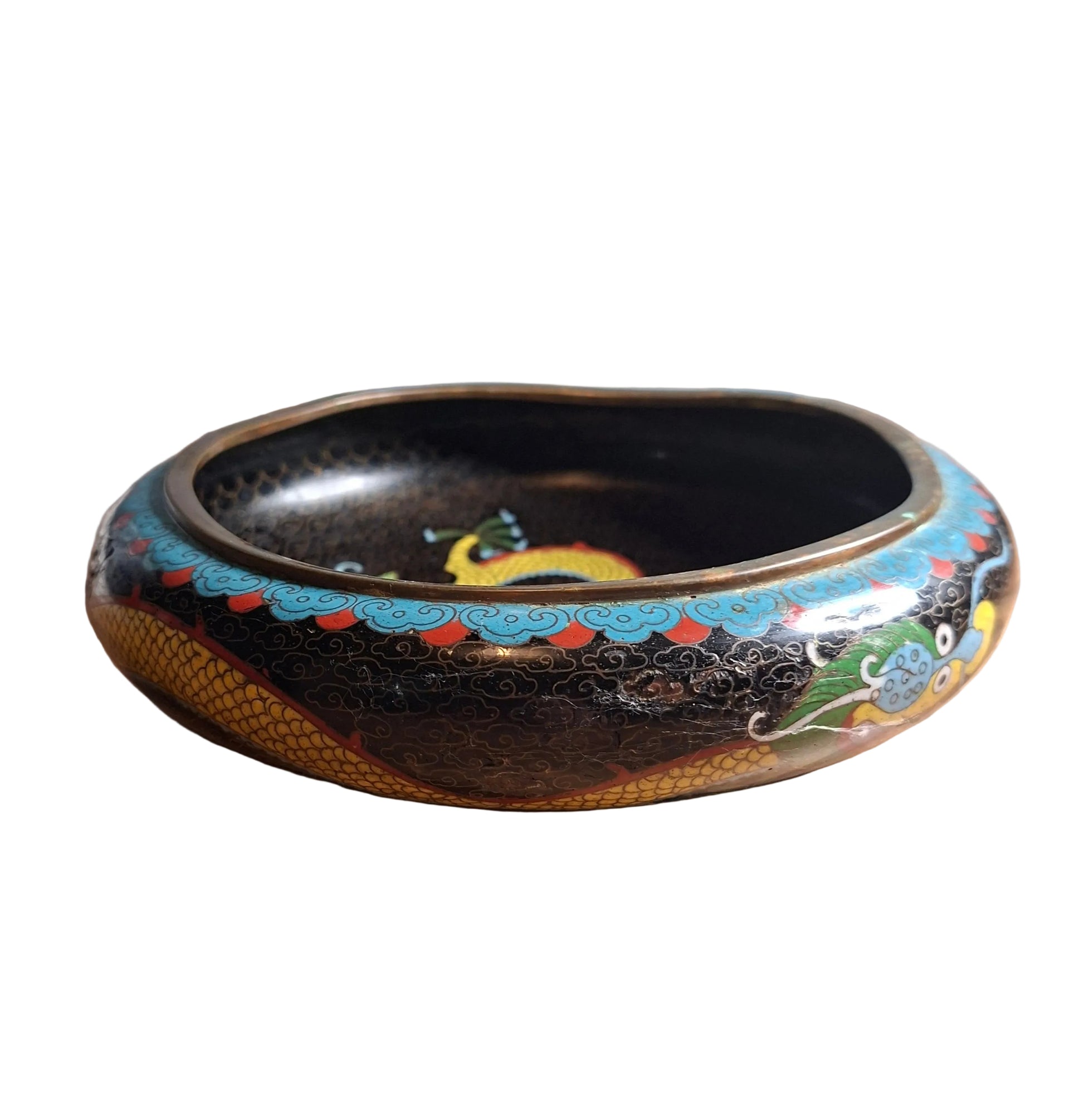 An Antique cloisonne low brass bowl with a dynamic dragon motif