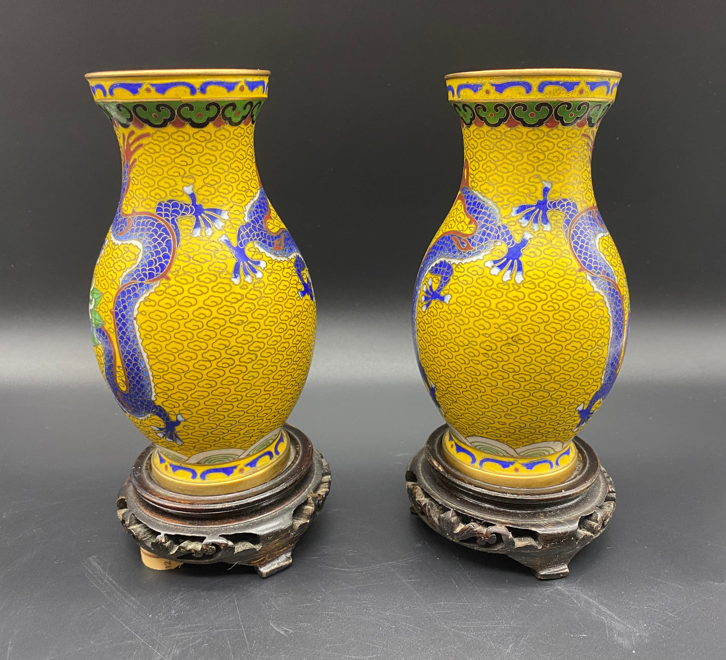 The vessel is usually fired at a relatively low temperature, about 800°C. Enamels commonly shrink after firing, and the process is repeated several times to fill in the designs.