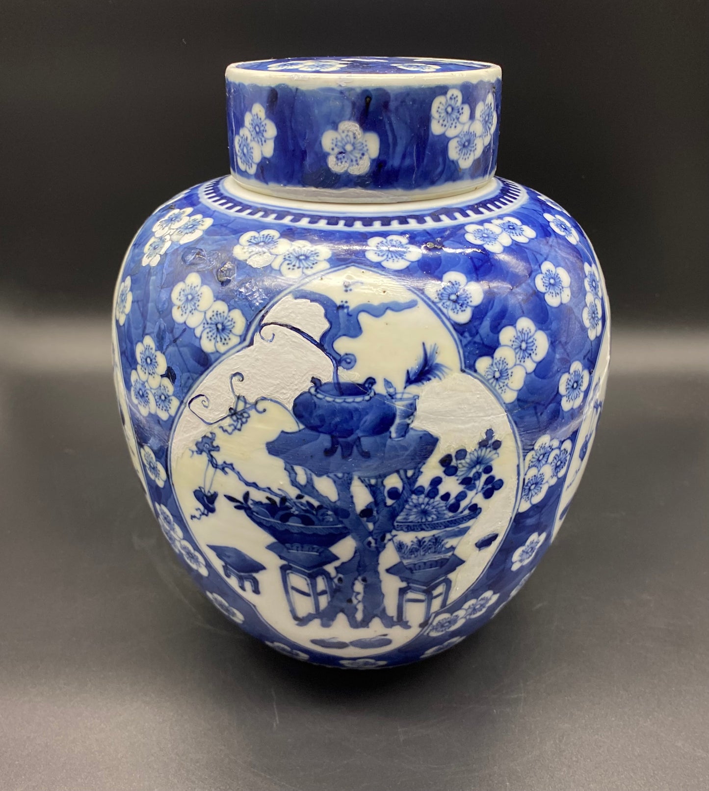 The beautiful blue color and prunus decoration make it a valuable addition to any collection. 