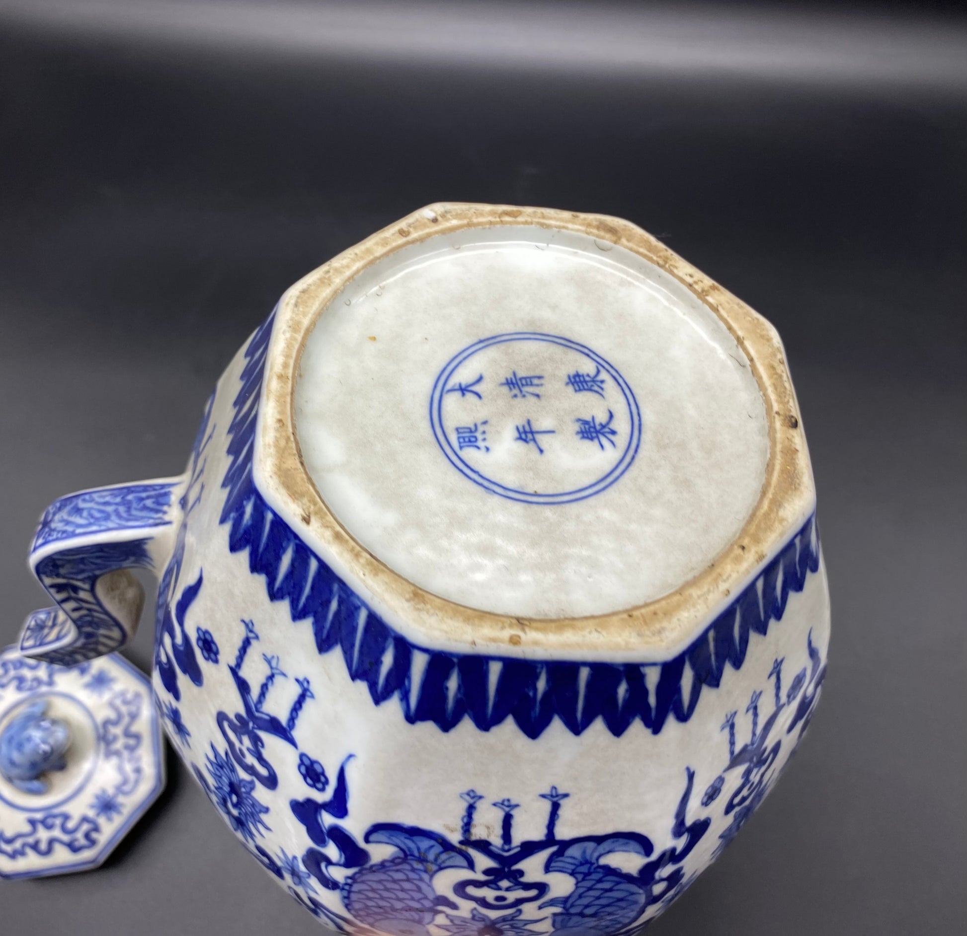 Antique Chinese hand painted blue and white porcelain covered teapot decorated with Fish scenes and frog lid. Circa Qing Dynasty period, 18th/19th century. Very good condition; No chips, cracks or repairs. Normal kiln spotting that one should expect from Antique Chinese porcelain.