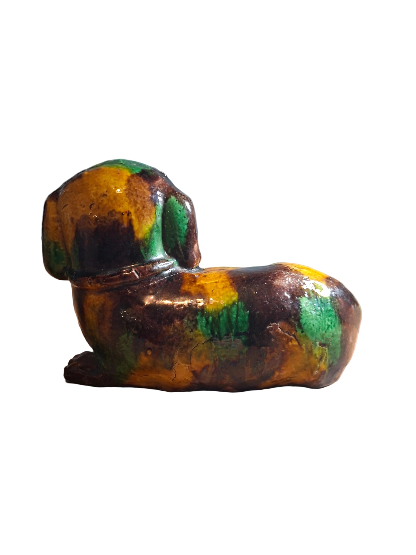 18th Century Chinese Kangxi 'egg and spinach'-glazed biscuit porcelain figure of a dog.