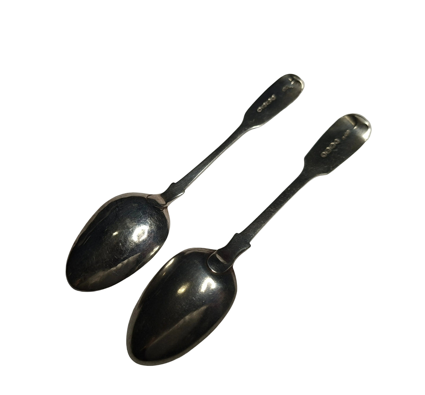 A charming pair of Antique Victorian Silver Spoons, hallmarked London 1845 and 1863. Crafted in solid silver with a combined weight of 41 grams