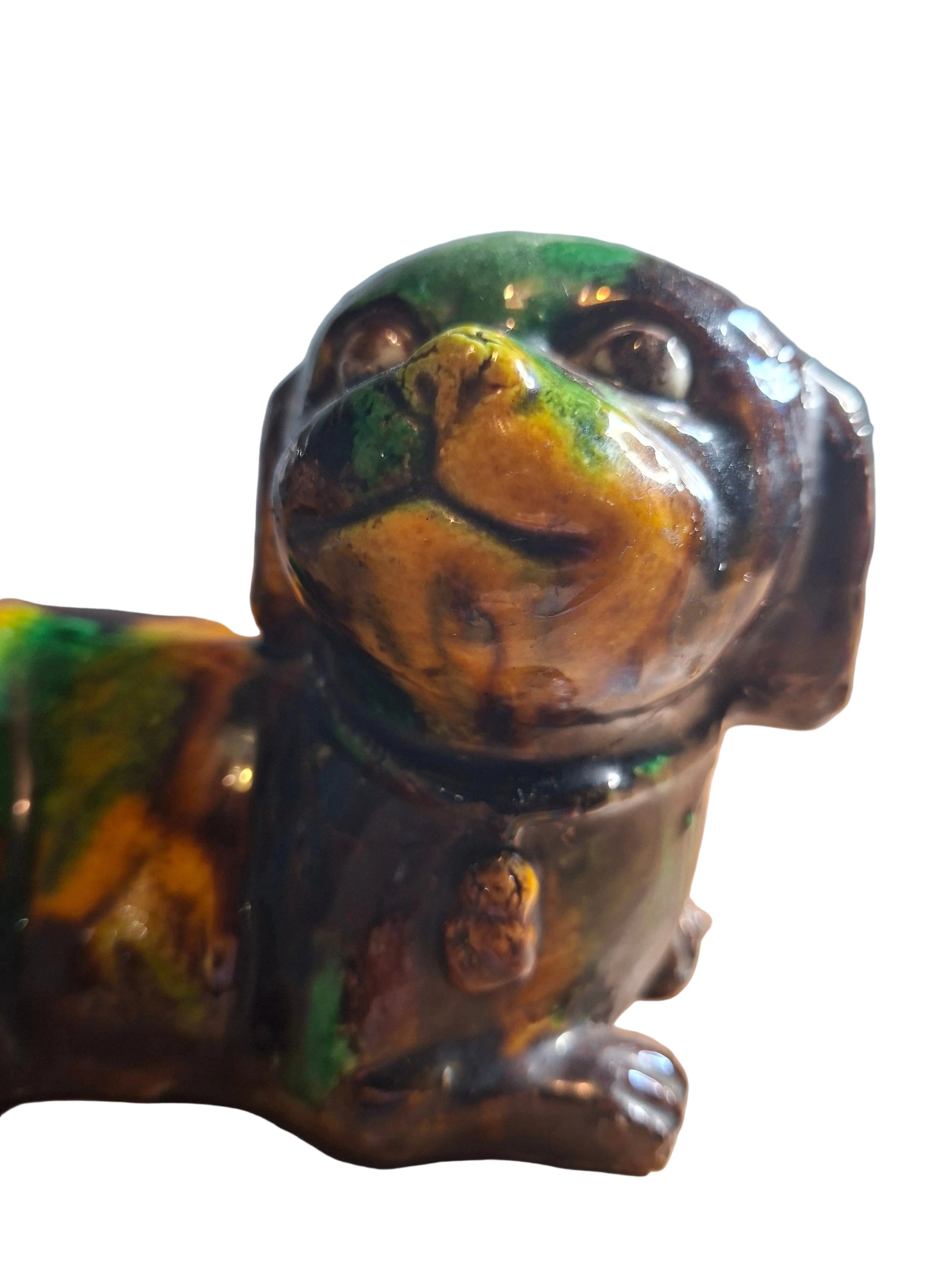 Chinese Kangxi 'egg and spinach'-glazed figurine model of a small dog