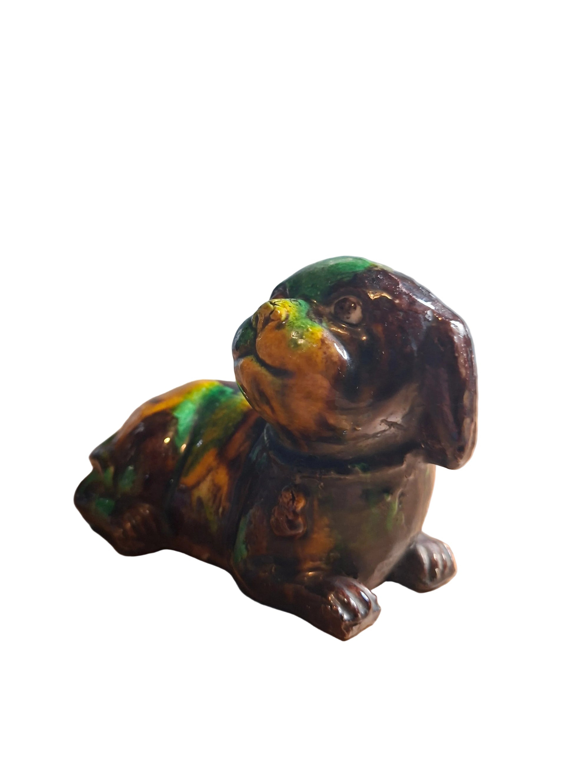 Chinese glazed biscuit porcelain figure of a dog.