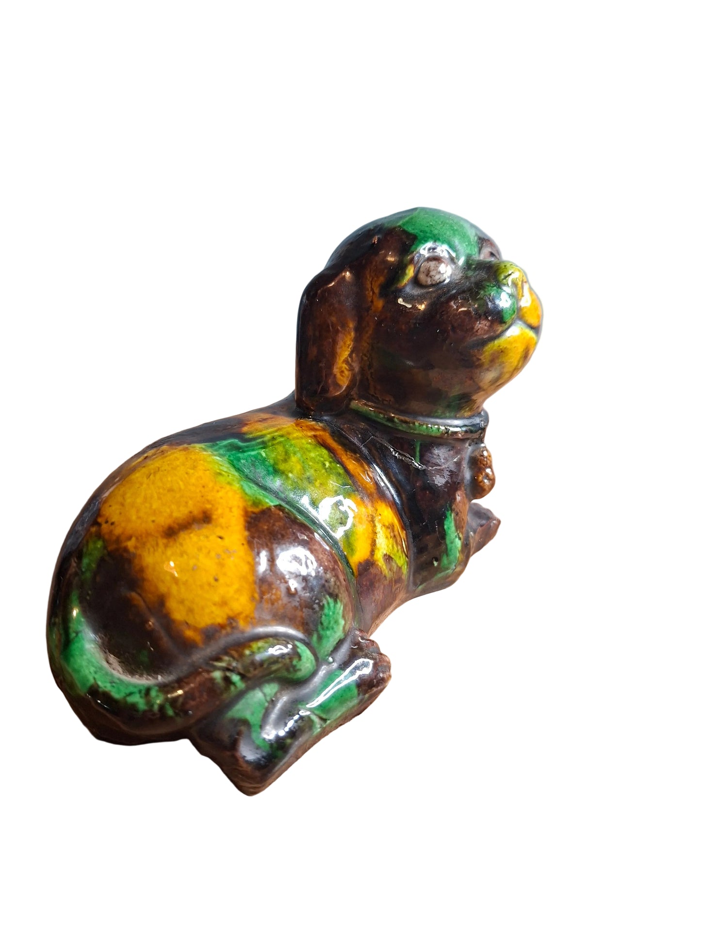 Antique Chinese Kangxi 'egg and spinach'-glazed biscuit porcelain figure of a dog.