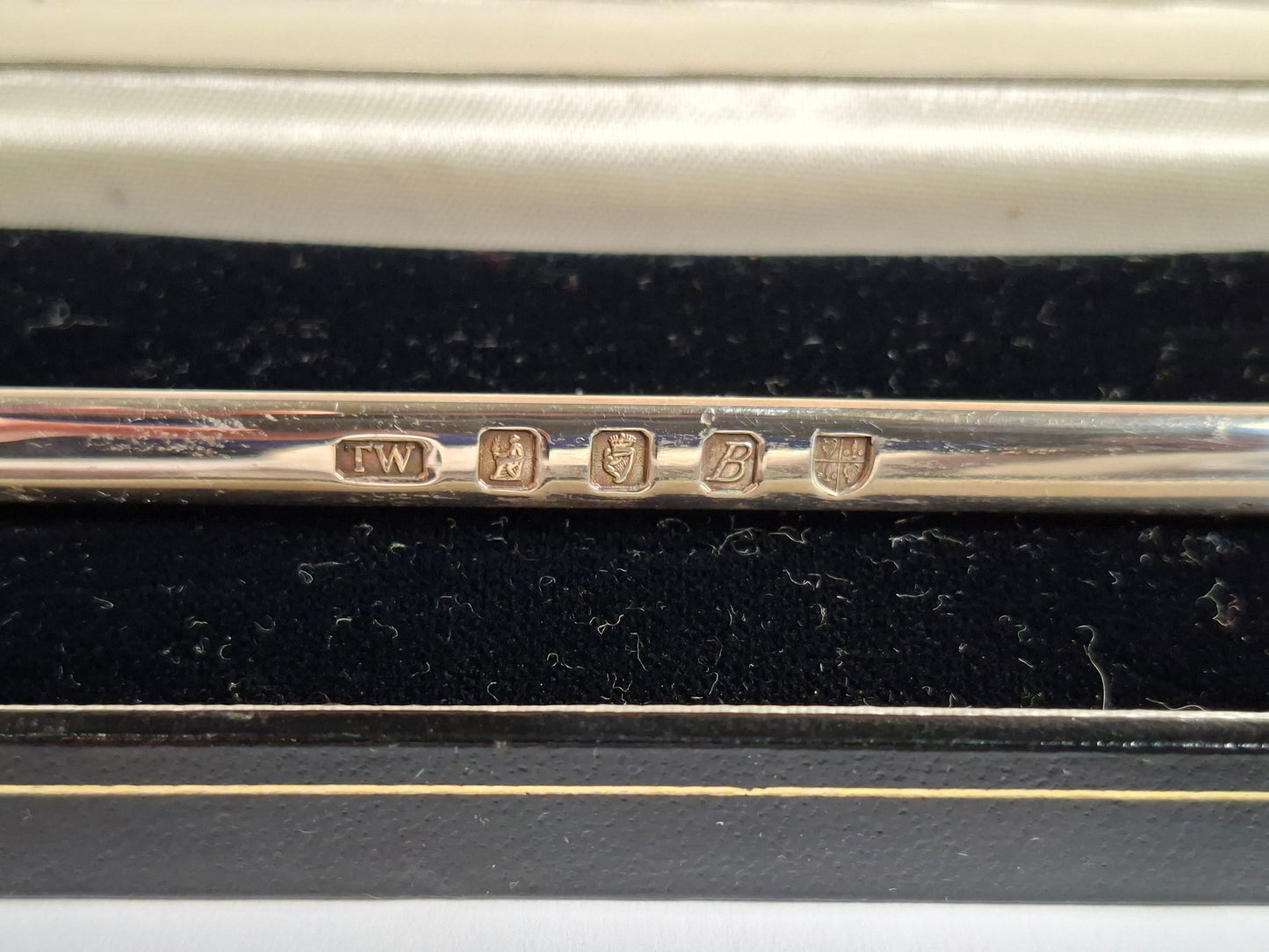 Hallmark of a vintage Irish silver letter opener with an equestrian figure mount.