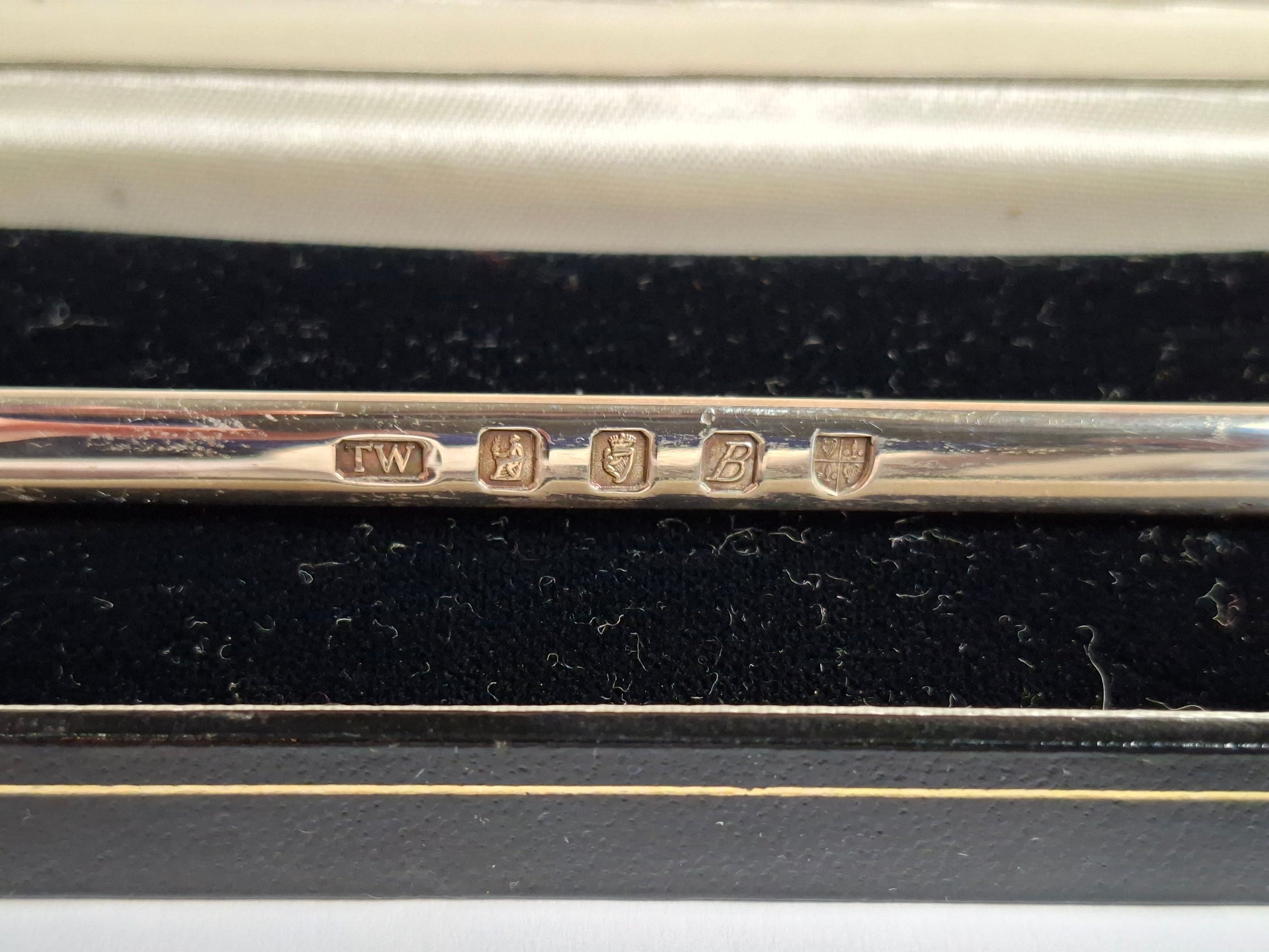 Hallmark of a vintage Irish silver letter opener with an equestrian figure mount.