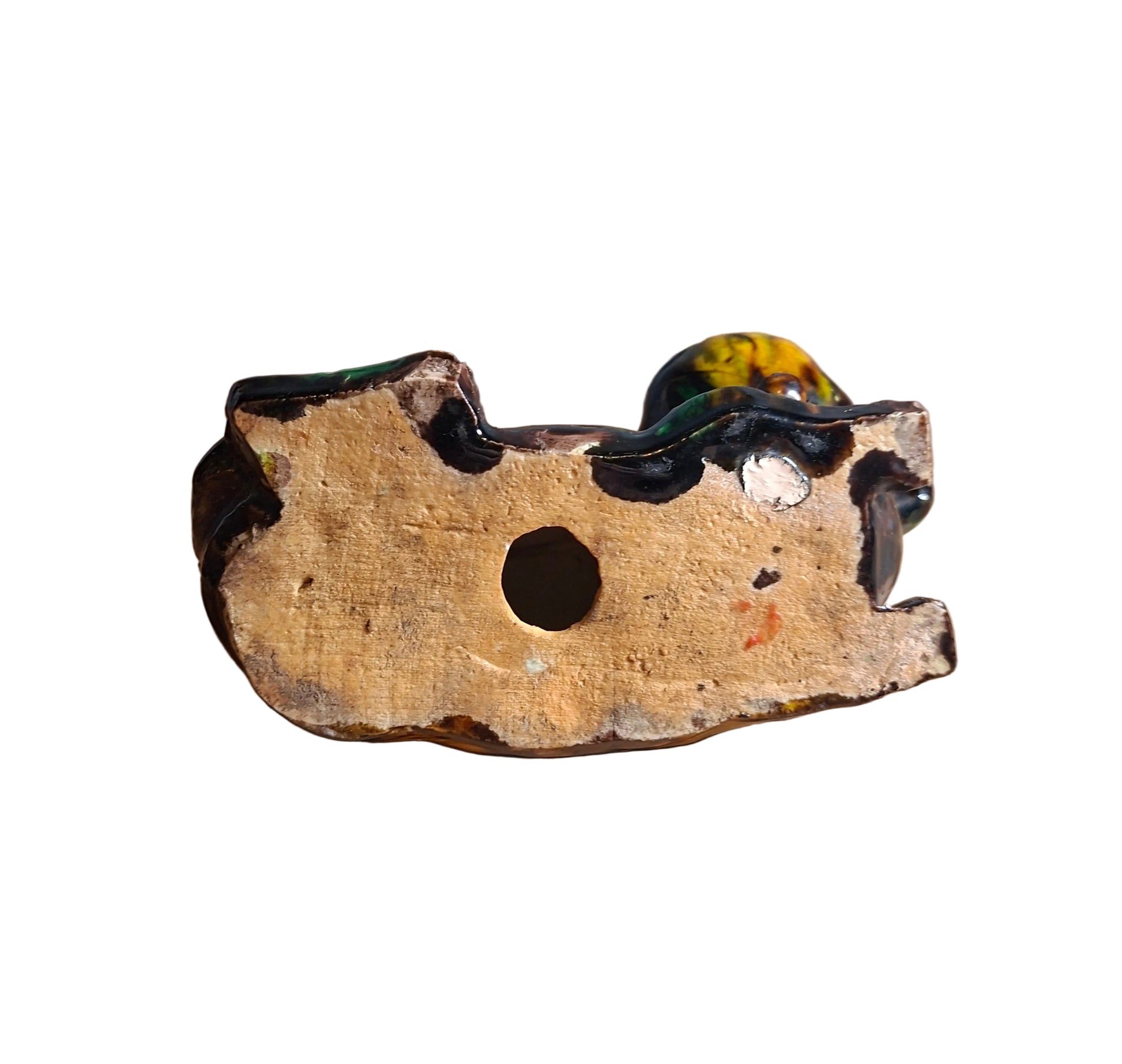 Bottom of an antique Chinese Kangxi 'egg and spinach'-glazed biscuit porcelain figure of a dog.