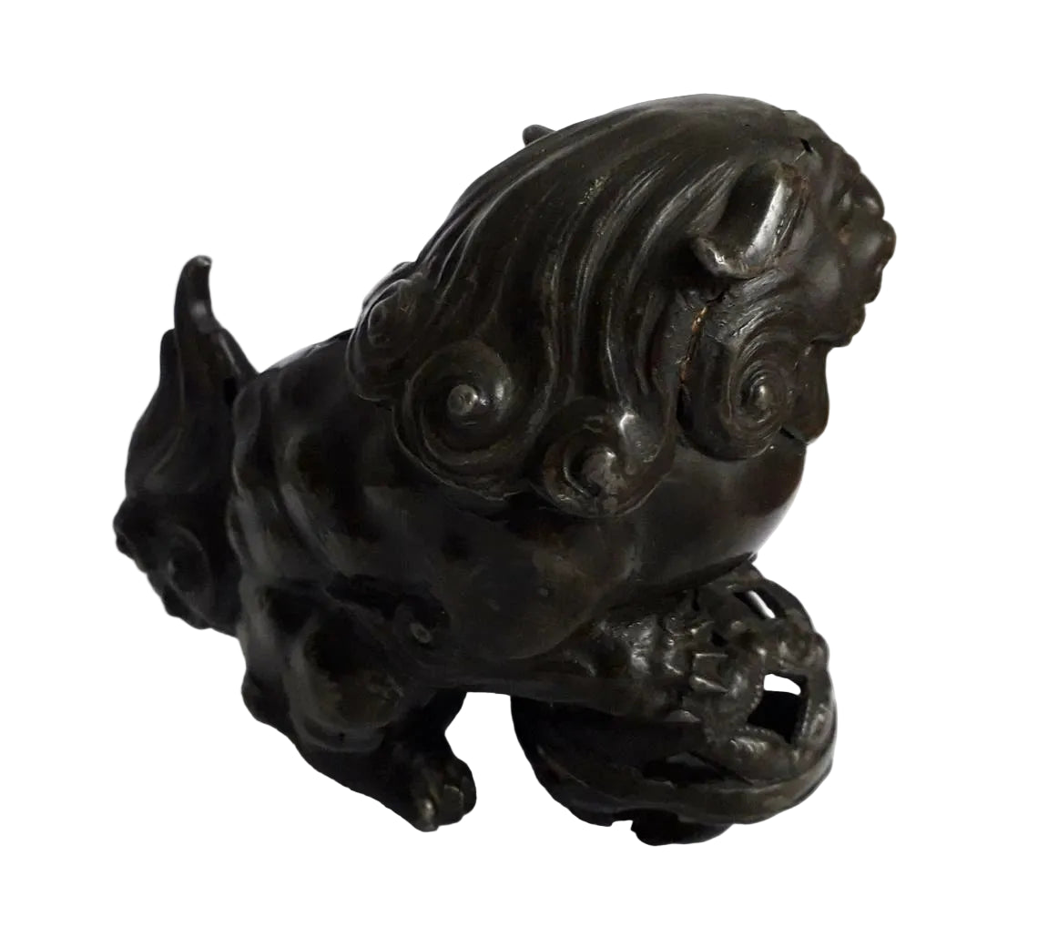 A Chinese bronze Foo Dog, also known as an Imperial Guardian Lion, dates to the early–mid 20th century and embodies centuries of protective symbolism. 