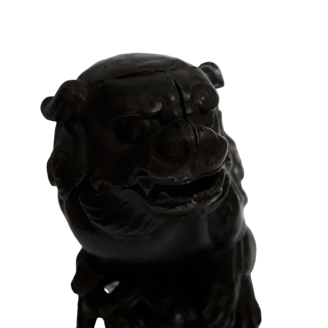 An antique  Chinese bronze Foo Dog, also known as an Imperial Guardian Lion, dates to the early–mid 20th century and embodies centuries of protective symbolism. 