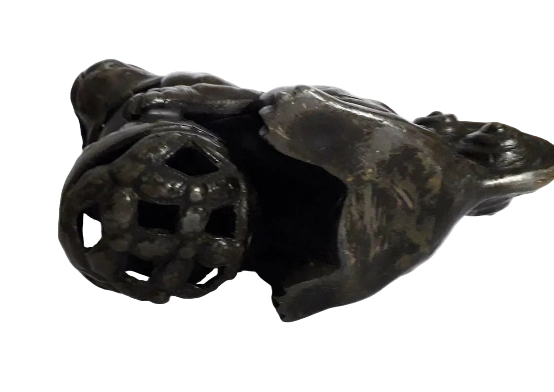 Antique oriental bronze Foo Dog, also known as an Imperial Guardian Lion, dates to the early–mid 20th century and embodies centuries of protective symbolism. 