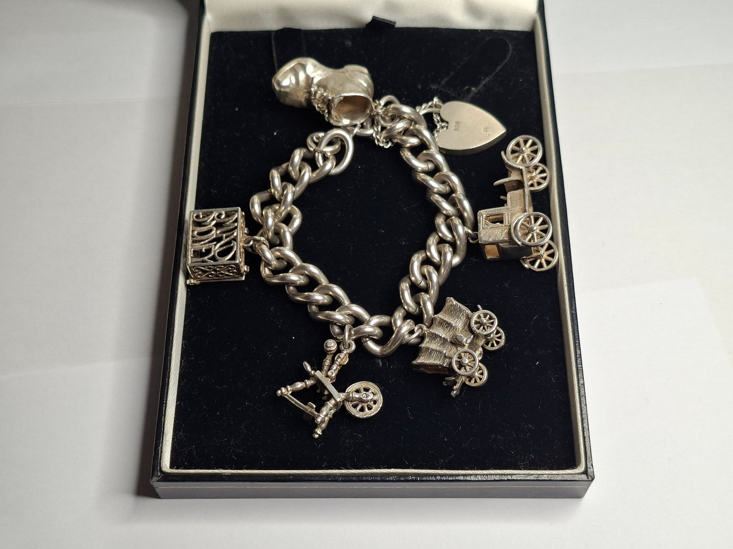 Sterling Silver Charm Bracelet, beautifully crafted and full of character. Made from genuine sterling silver