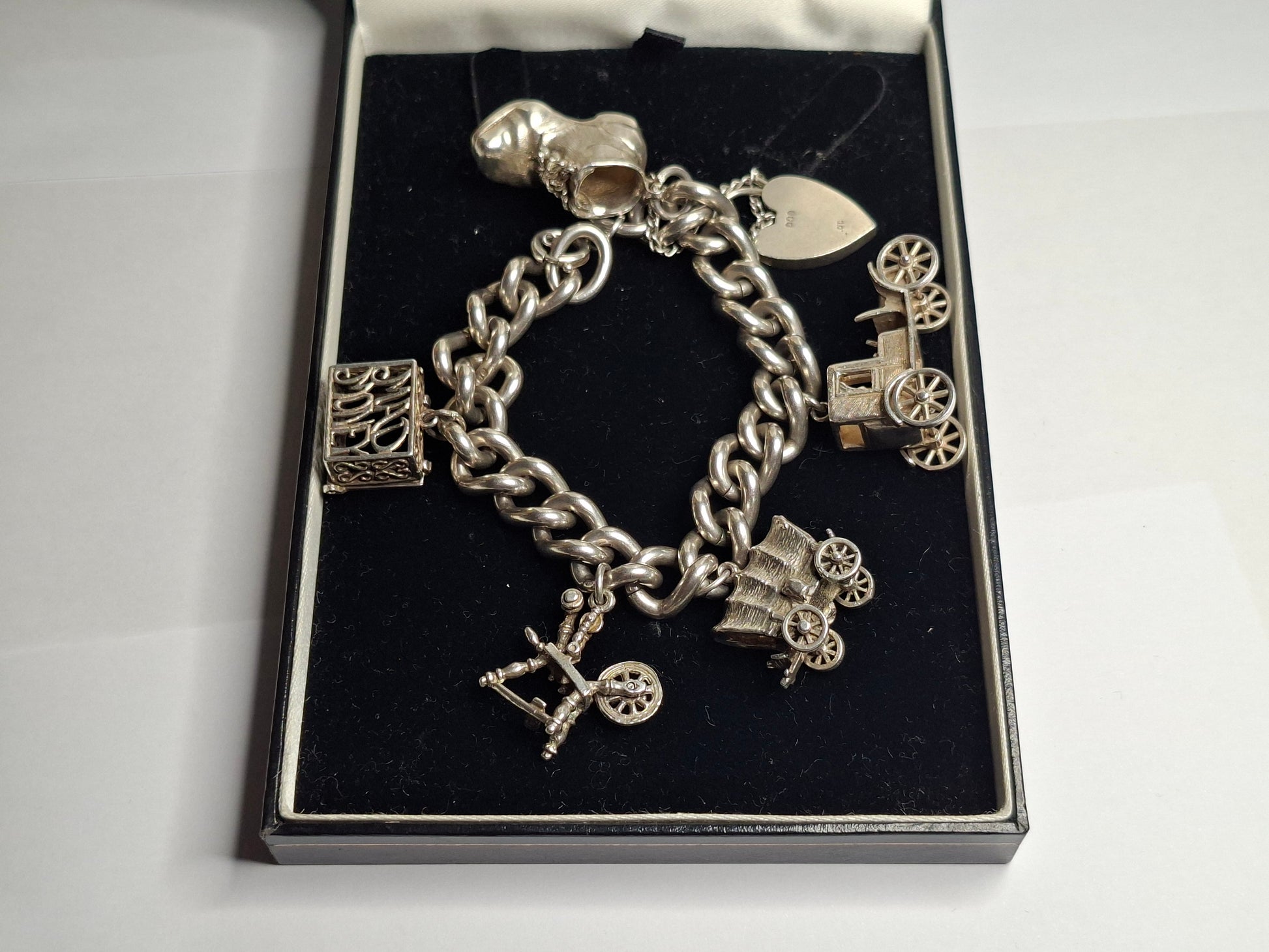 Sterling Silver Charm Bracelet, beautifully crafted and full of character. Made from genuine sterling silver