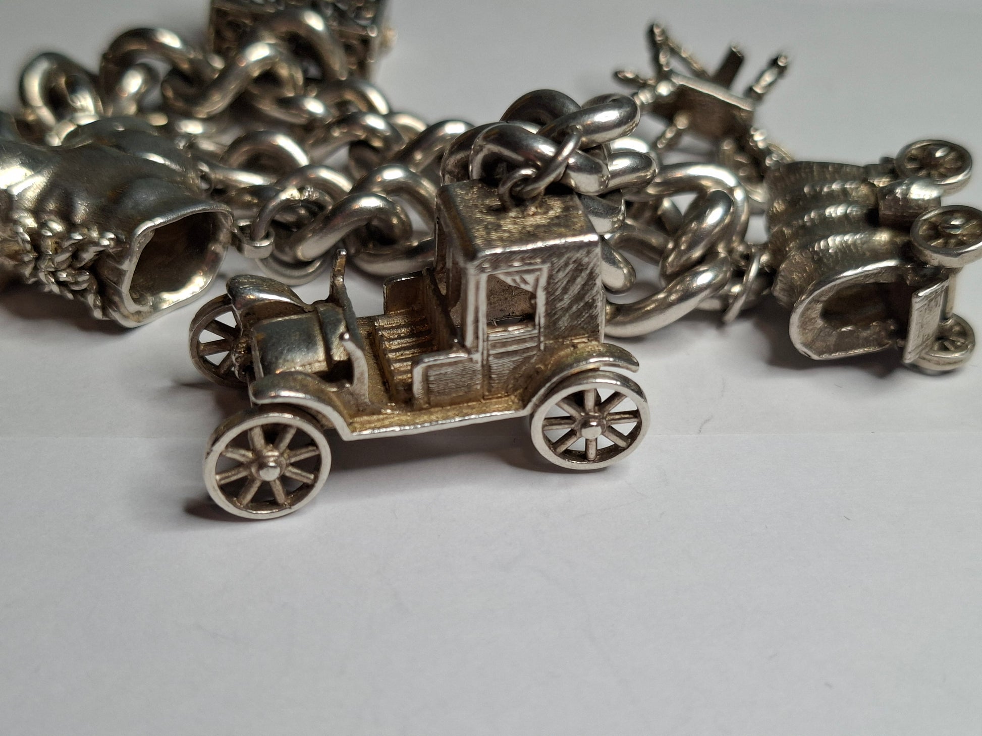 Antique Silver Charm Bracelet, beautifully crafted and full of character. Made from genuine sterling silver