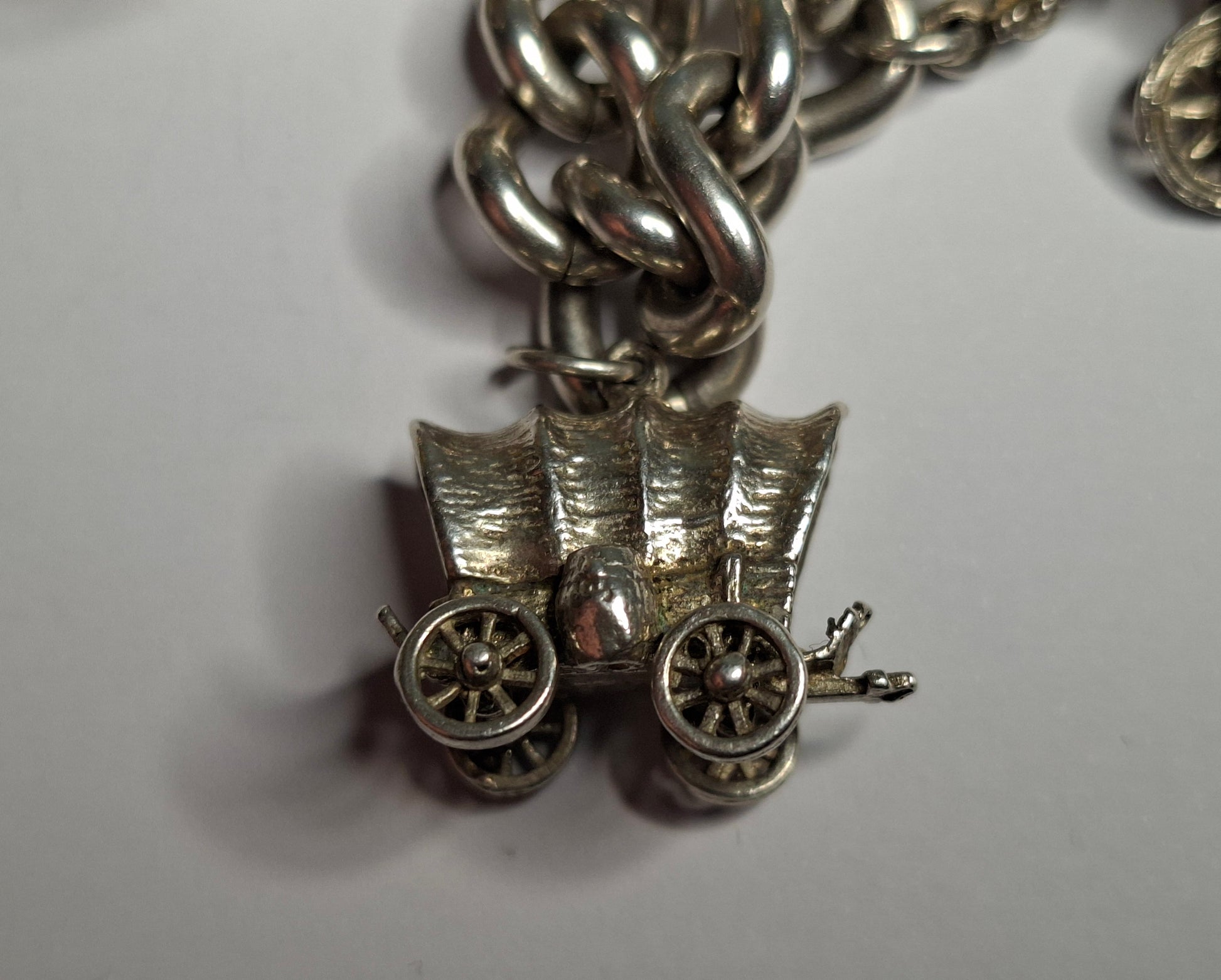 Vintage 925 Sterling Silver Charm Bracelet, beautifully crafted and full of character. 