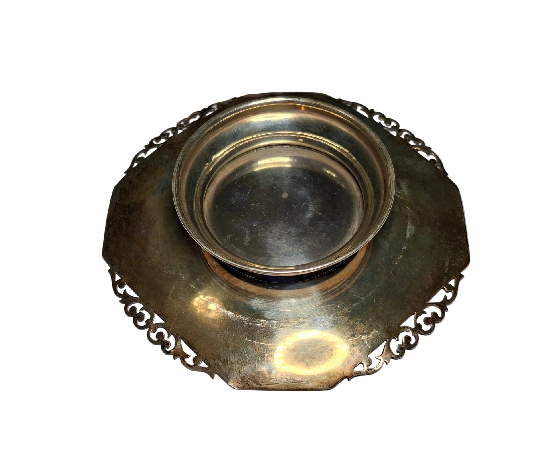 Bottom view of an antique solid silver scrollwork footed dish, fully hallmarked in Birmingham
