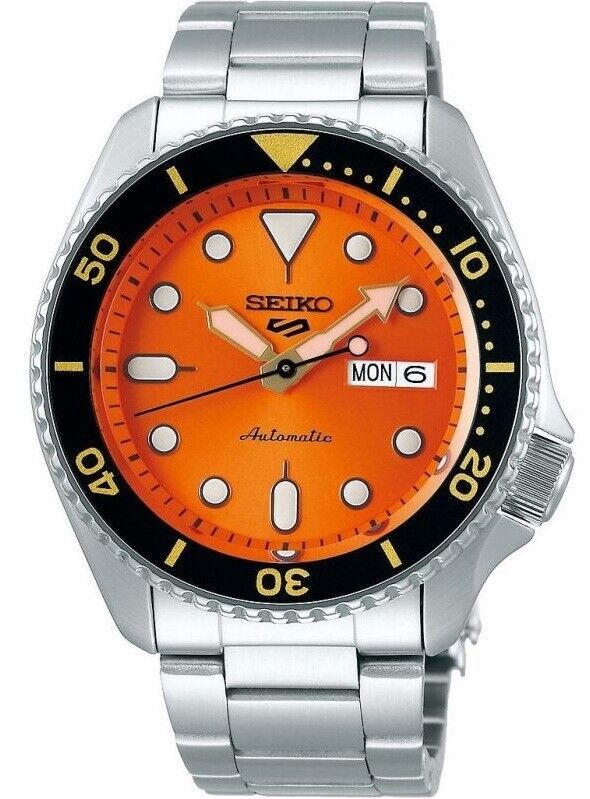 Seiko presents this 5 Sports timepiece featuring an orange dial with a date window.